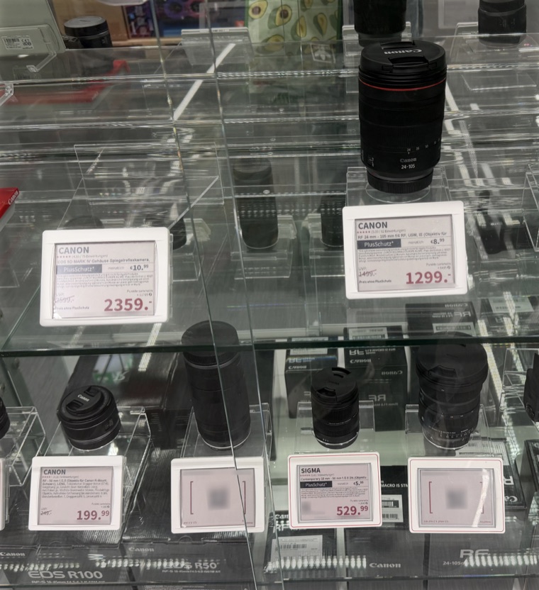 Electronic shelf labels on a camera display in an electronics shop